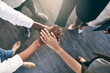© Ruan Jordaan/peopleimages.com - Stacking the team higher and higher. Shot of a motivated group of unrecognizable businesspeoples hands forming a huddle.
