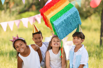 Canvas Print - Cute children at pinata birthday party