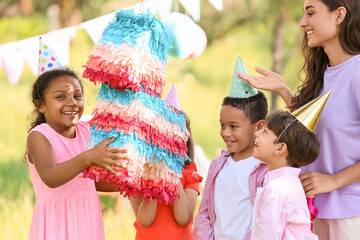 Poster - Woman and cute children at pinata birthday party