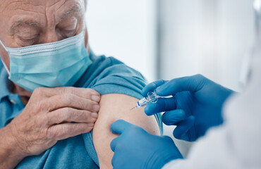 Poster - Just a little prick and hell be vaccinated. Cropped shot of a handsome senior man getting his covid 19 vaccine.