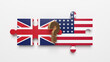 Gold-colored question mark symbol.  American and English flags are on the puzzle piece. International relation concept.  Horizontal composition with copy space. Isolated with clipping path.