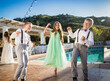 © Brocreative - Young kids dancing at a wedding having fun, living their best life. Older child lifestyle photo. Boy and girls getting groovy at an outdoor party.