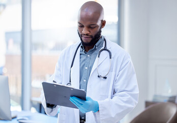 Poster - I have to hand this treatment plan over to the nurse. Shot of a male doctor filling out paperwork.
