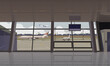 Airport terminal with large windows overlooking the planes. Vector.