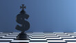Black-colored king-chess piece-shaped Dollar symbol. On chessboard. Horizontal composition with copy space. Focused image