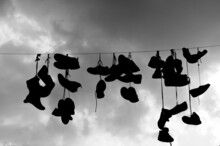 Shoes Hanging On A Wire
