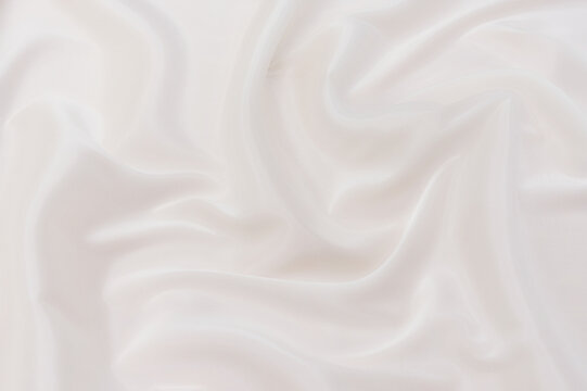 Wall Mural -  - Abstract and soft focus wave of white or ivory fabric background, white ivory texture and detail