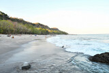Fototapeta Na sufit - waves crashing on rocks, photo as a background taken in Nicoya, Costa rica central america , montezuma beach