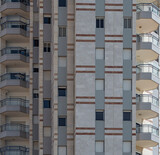 Fototapeta  - A fragment of a residential building under construction, the final stage