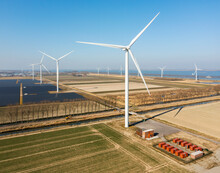 Netherlands, Solar And Wind Farm In Rural Landscape