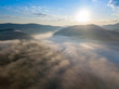 © Sergey - Sunrise over the fog in the Ukrainian Carpathians. Aerial drone view.