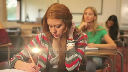Poster - Animation of light over diverse female students writing in notebooks