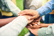 © Tamani Chithambo/peopleimages.com - Hard times will reveal true friends. Cropped shot of a group of people joining their hands together.