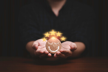 Aufkleber - Businessman holding and giving smile face with five golden stars which print screen on round wooden for client or customer excellent evaluation after use product and service concept.