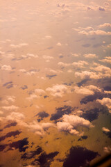 Wall Mural - top view from fly, aerial view of clouds in blue sky