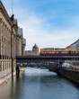 Berlin, Germany: S-Bahn train passing by on the bridge of Museum Island. The building of Humboldt Forum on the background