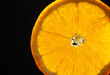 Slice of Orange, Cut Out, Isolated on Black Background, Full Depth of Field, Full Color