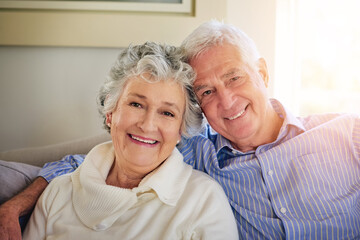 Poster - Love is what holds us together. Portrait of a senior couple relaxing at home.