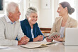 © Anne/peopleimages.com - It pays to plan properly for the future. Cropped shot of a senior couple getting advice from their financial consultant.