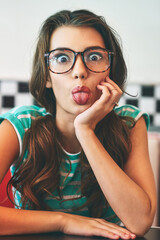 Poster - So what, Im having fun. Shot of a beautiful young woman in a diner.