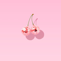 decorate disco balls like cherries. the concept of minimal entertainment. flat lai.