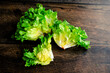 Overhead View of Fresh Escarole: Three pieces of green escarole lettuce shown from above