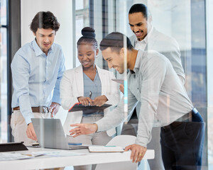 Sticker - A tech-focused team. Shot of a group of businesspeople brainstorming and exchanging ideas in a modern office.