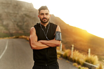 Poster - Working out has made him more confident. Shot of a young man exercising outdoors.