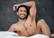 © Kay Abrahams/peopleimages.com - Keep feeding yourself positive thoughts. Shot of a handsome young man lying on his bed.
