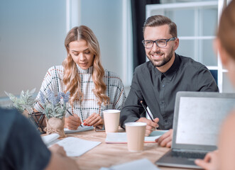 Poster - modern business team standing near the office Desk