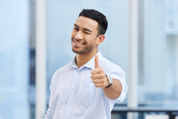 Aufkleber - You made the right choice by picking my business. Shot of a handsome young businessman standing alone in the office and making a thumbs up gesture.