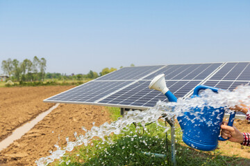 Wall Mural - Water pumps and solar panels in farm.