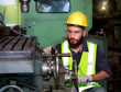 © atitaph - Portrait of a male engineer, professional, skilled labor, quality skills, inspecting and controlling machines.