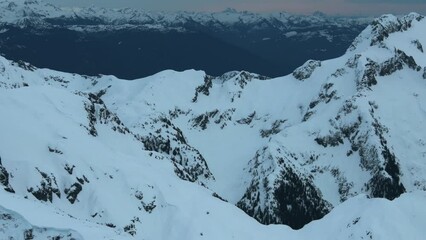 Wall Mural - 4k aerial of tantalus range in the coast mountains in late winter, british columbia, canada