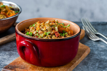 Sticker - Green lentils stew with white wine, Serrano ham and smoked paprika