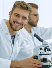 Wall Mural - male researcher carrying out scientific research in a lab