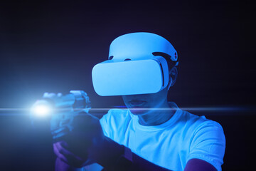 Wall Mural - man with virtual reality headset is playing game.
