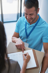 Aufkleber - I just need some of your details over here. Cropped shot of a businesswoman signing for a package delivered by a courier to her office.