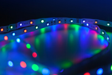 Sticker - Colorful LED lights stripe, close up photo with selective focus