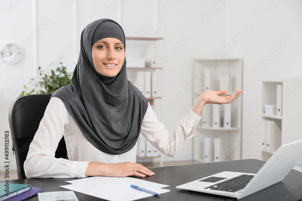 Muslim secretary working in office