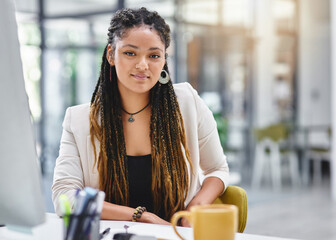 Poster - Im confident in my chances of success. Cropped portrait of an attractive young businesswoman sitting at her desk in the office.