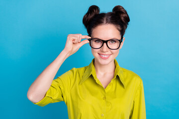 Poster - Photo of professional agent ceo lady touching her specs recommend new optics isolated blue color background