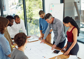 Poster - Design is creativity with strategy. Cropped shot of a group of architects in the boardroom.