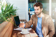 © AS/peopleimages.com - Freshly brewed business. Shot of a young entrepreneur having a cup of coffee in a cafe.
