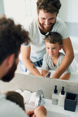 Sticker - Before you do anything, make sure your hands are clean. Cropped shot of a young handsome father helping his adorable little boy wash his hands in the bathroom at home.