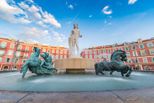 Fountain Of The Sun, Place Massena In Center Of Nice, France, Place Carlou Aubert, Tourism, Sunny Day, Blue Sky, Square Tiles Laid Out In A Checkerboard Pattern, Apollon Statue
