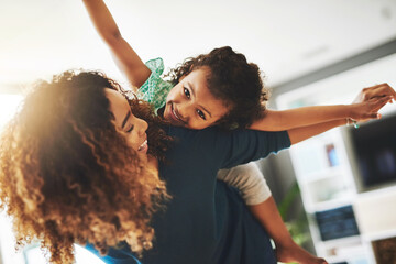 Sticker - Theres real magic in motherhood. Shot of a young mother and her daughter spending quality time together at home.