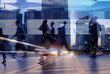 Leinwandbild Motiv business people crowd walking commuting in the city, lights and motion blur abstract 