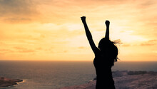 Strong Confident Woman With Fist Up To The Sky. 