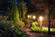 Leinwandbild Motiv Illuminated garden path patio